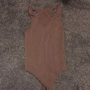 Selling bodysuit! Brand Sager rain, size medium, colour brown.